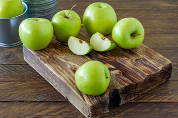 Green ripe apples on wooden desk. Rustic style. eco-friendly farming. sustainable food
