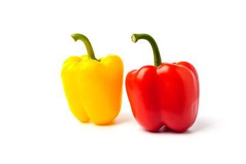 Fresh red and yellow bell peppers isolated on white