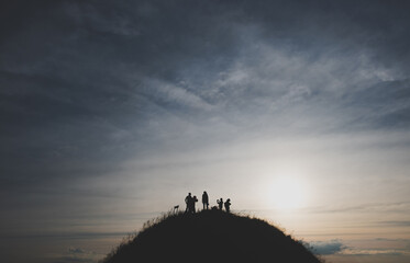 Silhouette on the top of the mountain With tourists walking up to see the beauty of nature On Khao Chang Phuak, Kanchanaburi