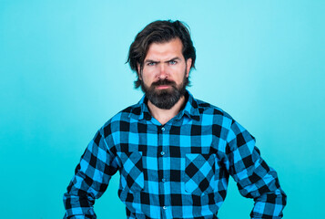 serious caucasian guy with brunette hair having perfect beard and moustache, hairdresser