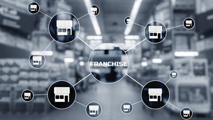 Franchise lettering on blurred warehouse background. Marketing system.