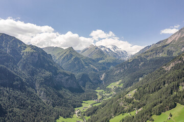 Aerial drone shot of Helligenblutt village in with view of Grossglockner mountain in Austria