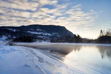 Winter theme at Hallingdalselva. A beautiful river in Hallingdal, Gol is freezing up in the cold...