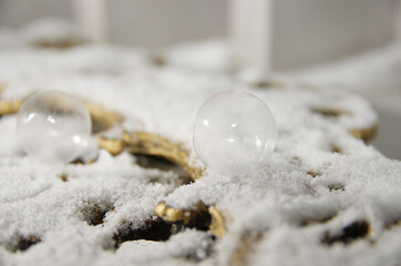 The frozen soap bubbles on snow