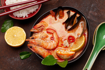 Traditional Thai soup Tom Yum and rice bowl
