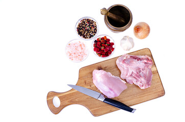 Raw meat. Two pieces of chicken thighs for cooking. Studio Photo