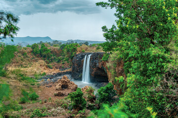 Blue Nile waterfalls in dry season. Fall on the Blue Nile river. Nature and travel destination. Ethiopia wilderness, Amhara Region, near Bahir Dar and Lake Tana
