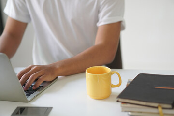 asian young student man entrepreneur working with computer studying learning online at home....