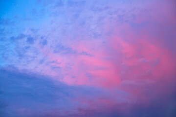 Fototapeta na wymiar Pink and blue clouds in the evening sky. Background image. Natural background.