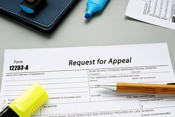 Business concept about Form 12203-A Request for Appeal with phrase on the sheet.