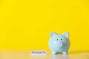 Piggy bank with savings on color background. Concept of pension