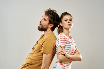 Young couple socializing romance lifestyle fashion fun light background