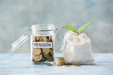 Jar and bag with savings and young plant on color background. Concept of pension