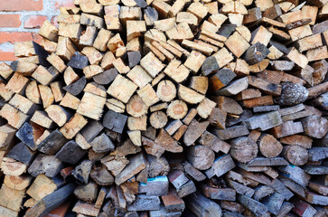 Wooden logs, boards, firewood. Harvesting firewood for the winter