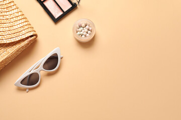 Set of female accessories and sunglasses on color background