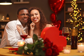 African-American couple celebrating Valentine's Day at home
