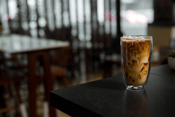 glass of coffee with milk on the table