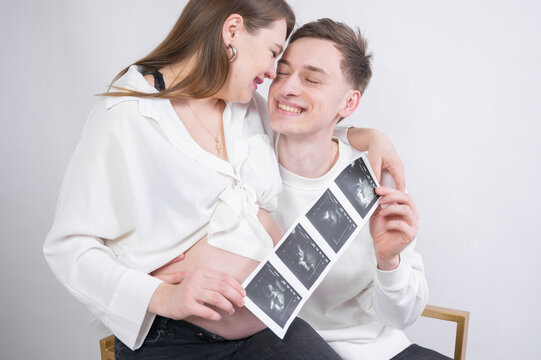 Young couple expecting their unborn child
