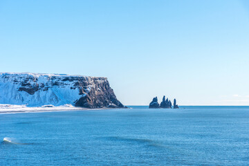 Naklejka premium Beautiful aerial winter landscape view of Reynisdrangar, Iceland.