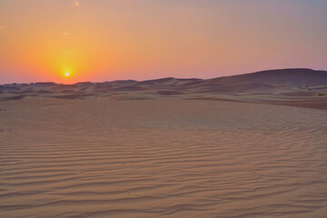 Fototapeta na wymiar Scenic View Of Desert Against Sky During Sunset
