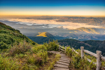 Tropical forest nature landscape view with toursits mountain range and moving cloud mist at Kew Mae...