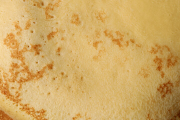 Delicious thin pancake texture background, close up