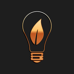 Gold Light bulb with leaf icon isolated on black background. Eco energy concept. Long shadow style. Vector.