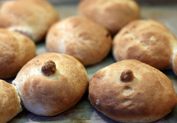 Warm and fresh homemade bread rolls. Food background