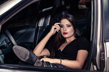 Fototapeta na wymiar Woman Sitting In Car
