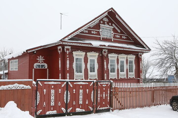 Vintage wooden rural house in Maydakovo village in Ivanovo region, Russia. Building facade;...