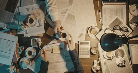 Business people working late at night