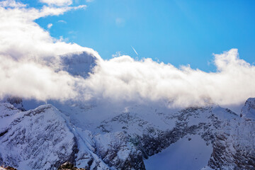 Panorama view of European Alps in sunny day with some clouds, Les Arcs, Savoie, France