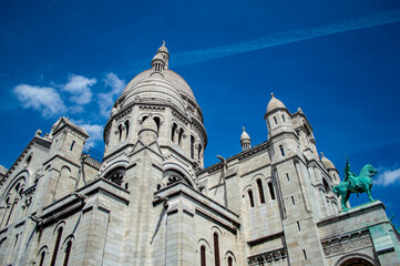 Fototapeta premium Paris, France - July 19, 2019: Side view of the Basilica of the Sacred Heart (SacrÃ© Coeur) in Paris, France