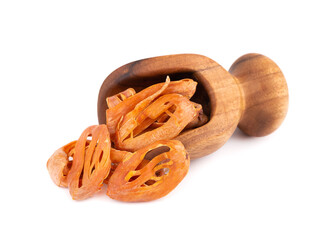 Mace in a wooden scoop, isolated on white background. Nutmeg flower, myristica fragrans. Natural spice, asian seasoning.