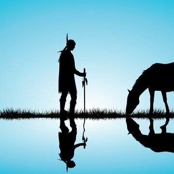 American Indian silhouette with horse on the shore of a lake reflecting in the water