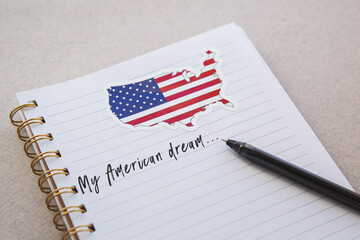 notebook with american flag and country map with inscription my american dream, emigration concept 