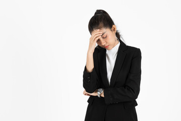Frustrated overworked and confused young Asian business woman in suit troubled with financial problem over white isolated background.