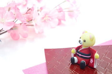 春のイメージ　桜とくまちゃん