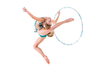 A gymnast girl in an emerald swimsuit performs an exercise with a hoop isolated on a white background