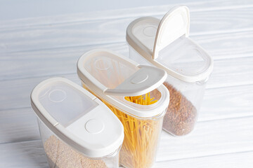 Groceries in plastic storage containers. Food storage concept