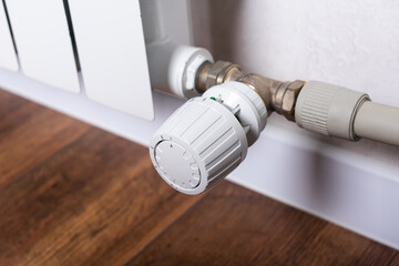 Heat regulation on a heating radiator