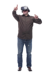 in full growth. casual man in virtual reality glasses.