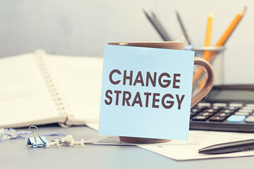 Change Strategy - concept of text on sticky note