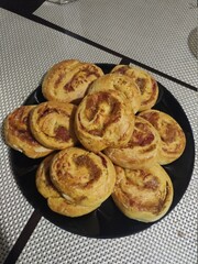 beautiful baked sweet buns on a baking sheet