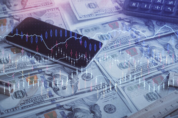 Naklejka premium Double exposure of forex graph drawing over us dollars bill background. Concept of financial markets.