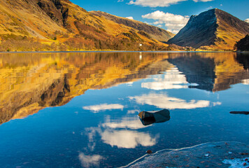 Mirror like reflections with icy foreground on Buttermere in the Lake District 2383