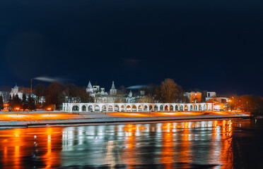 Volkhov River. Yaroslav Courtyard arcade on a winter night, Veliky Novgorod, Russia.