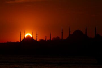 Maiden's Tower and Uskudar beach, together with mosque silhouettes