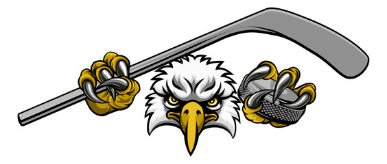 An eagle ice hockey player animal sports mascot holding a hockey stick and puck