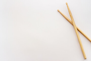 Top view of drum sticks with space for text. Music background